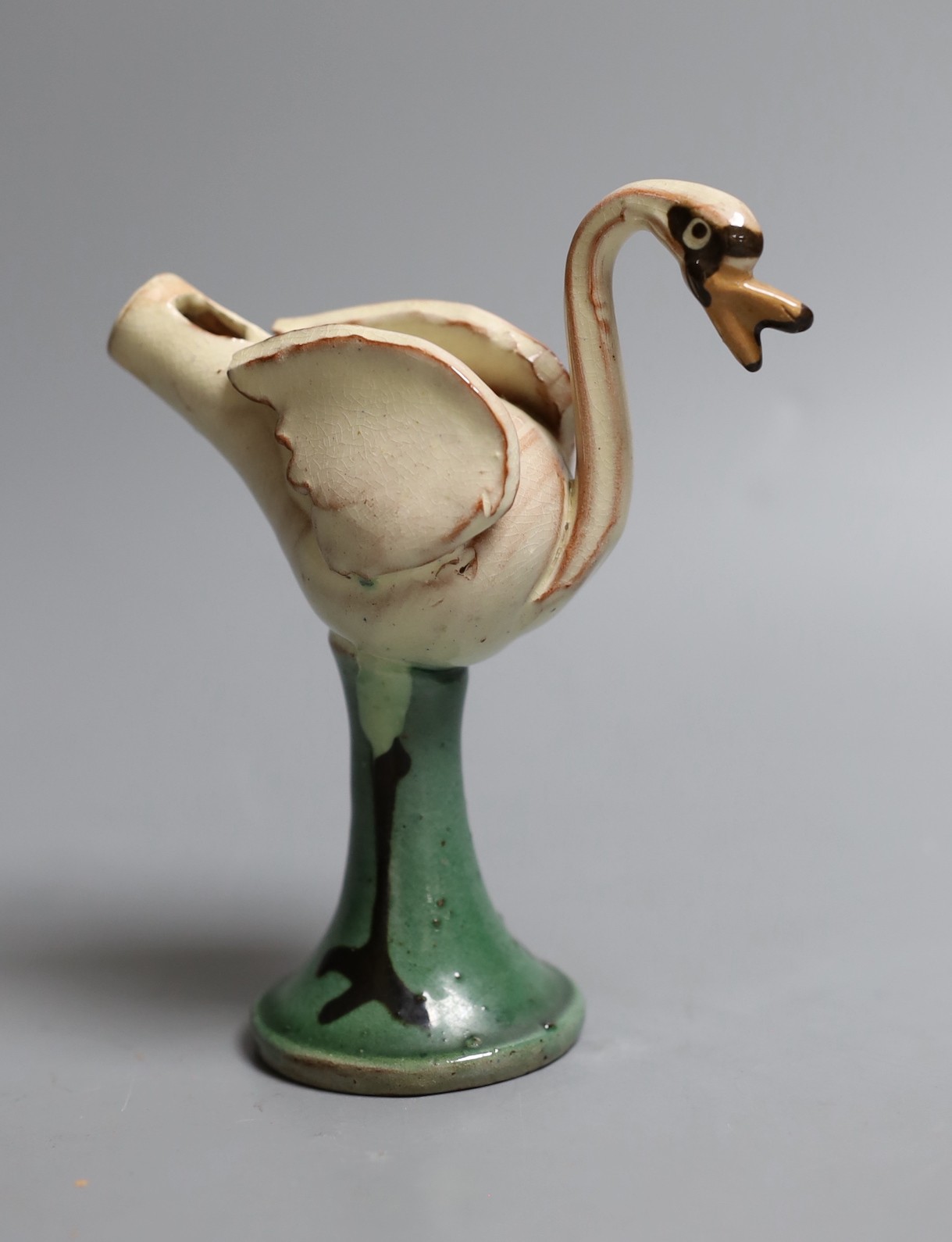 An unusual Studio ware novelty pottery swan whistle, makers monogram TR, 14 cms wide